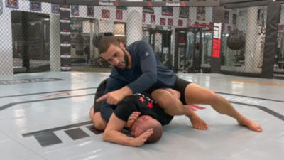 Clamp Guard to Omoplata to Back step Triangle Finish featured image