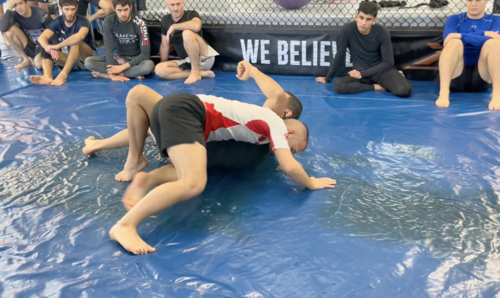 Thumbnail for Back Roll Arm Triangle Escape Video